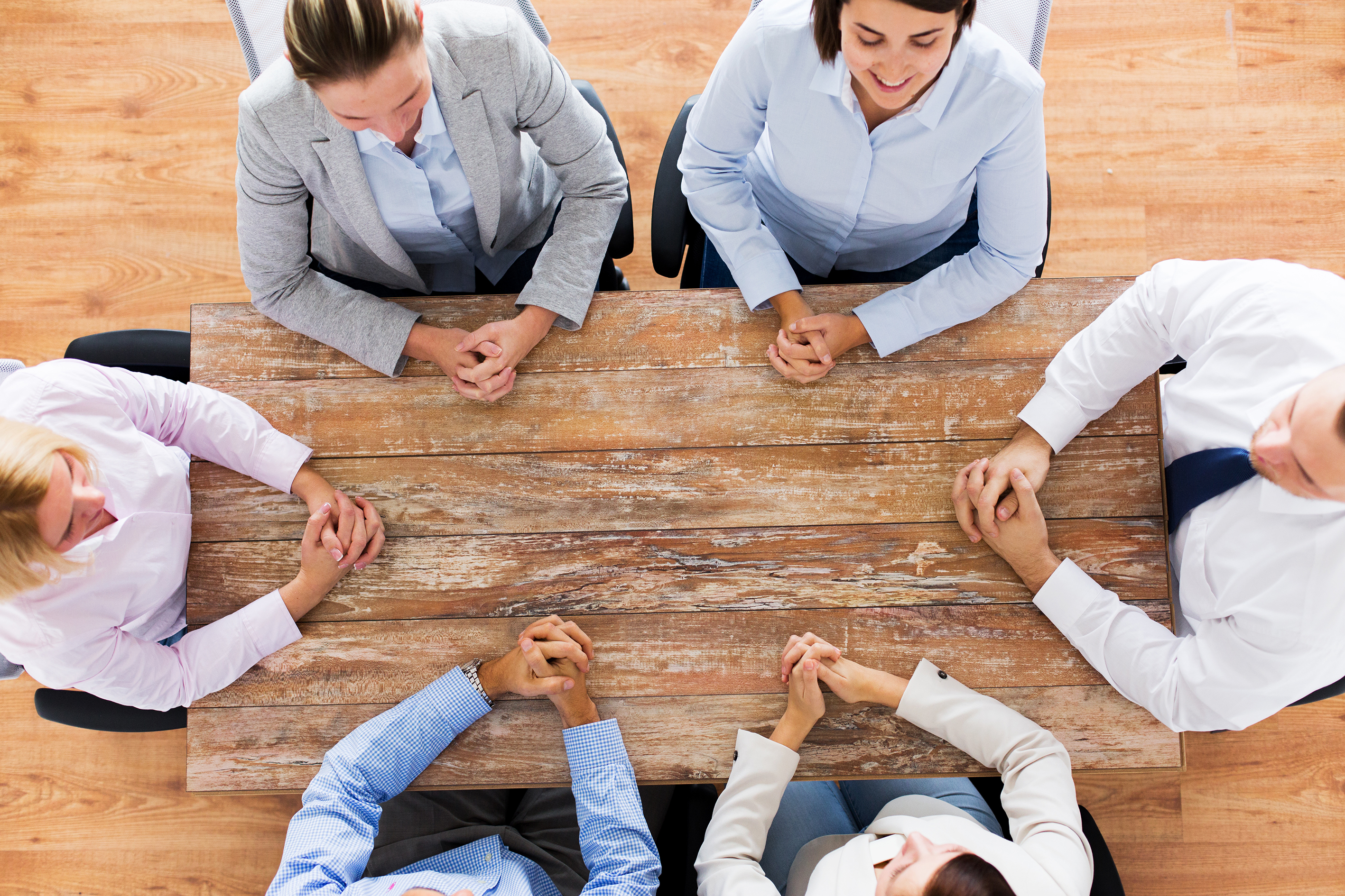 Business teamwork corporate concept group people sitting office table