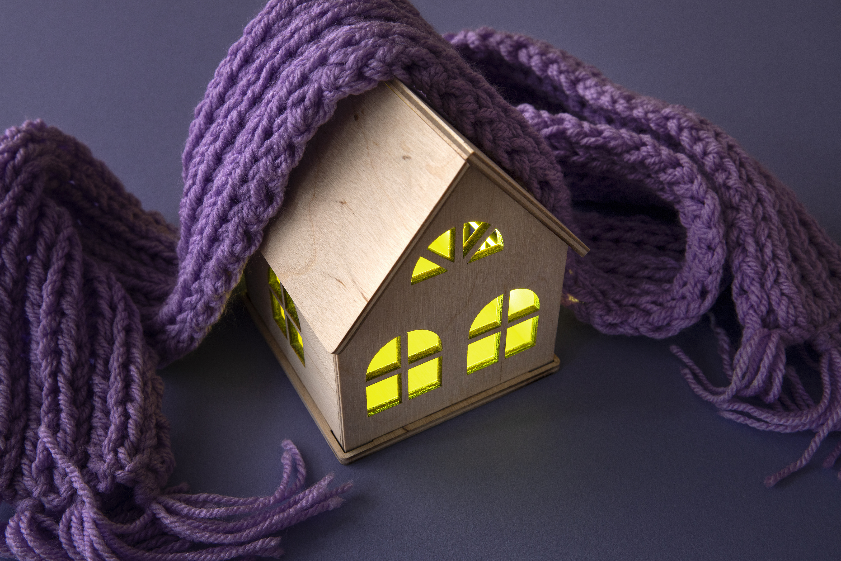 Cozy house concept with wooden toy house